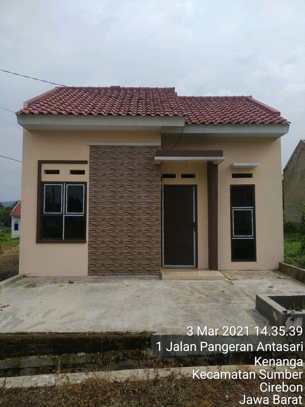 foto tampak rumah tipe 30/60 perumahan GRAHA KARTIKA KENANGA