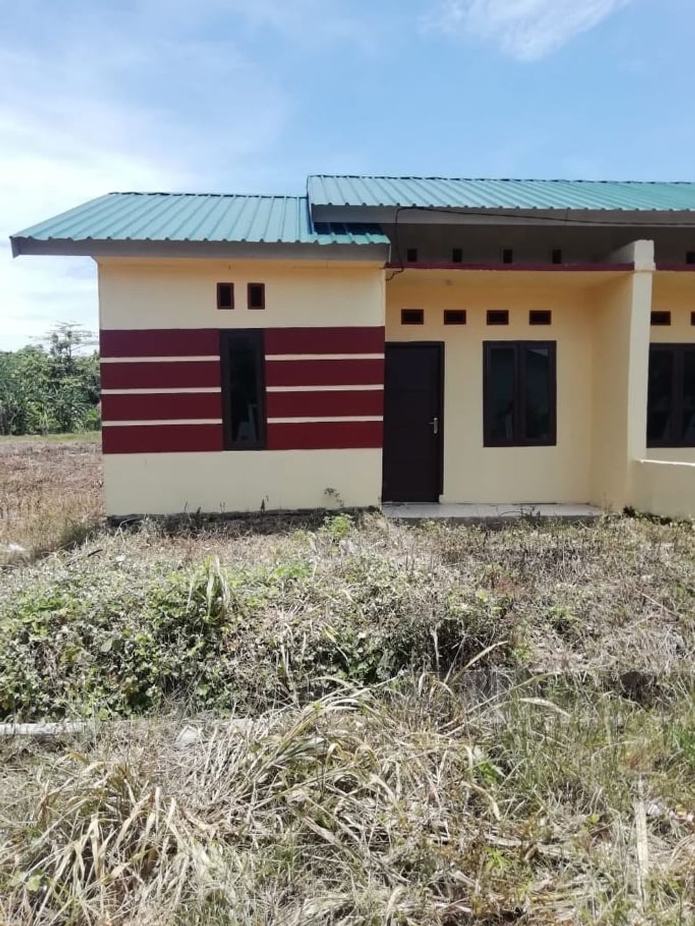 foto tampak rumah tipe 36/84 perumahan MATTIRO BULU MAS