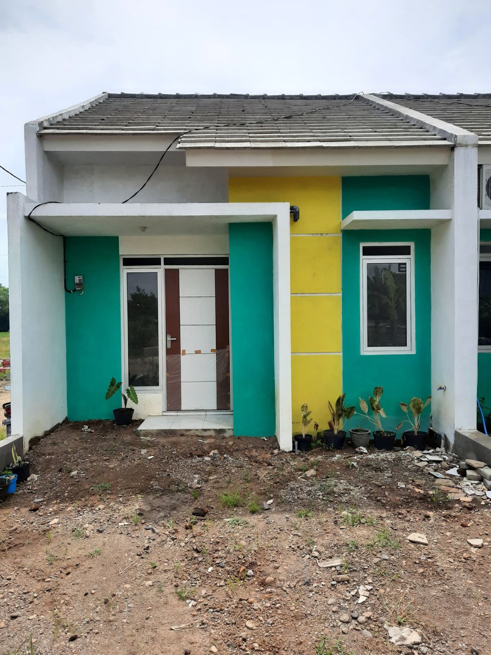 foto tampak rumah tipe Mutiara 30/60 perumahan Griya Permata Karang Kedawang