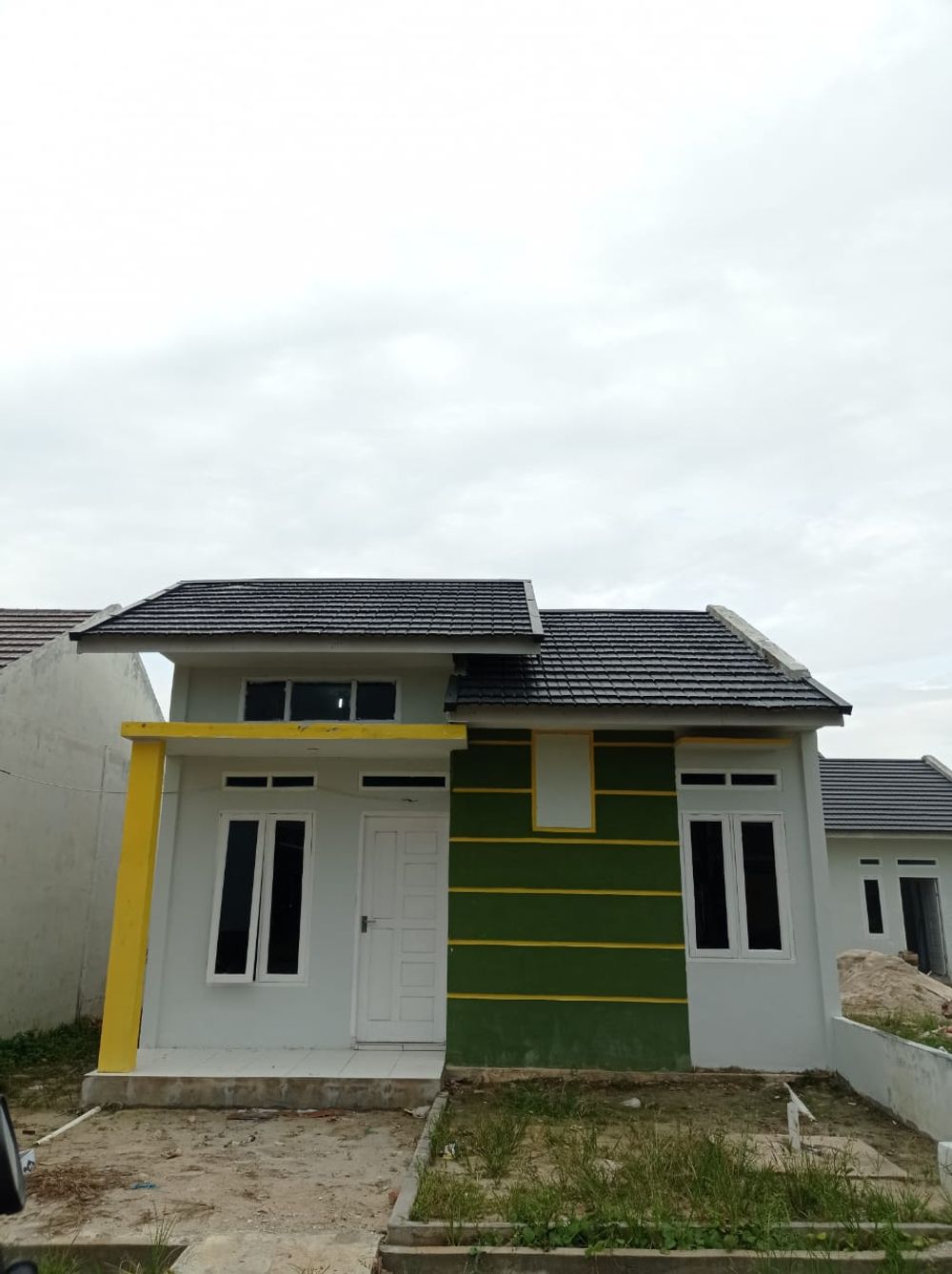 foto tampak rumah tipe 36 perumahan Bumi Tuah Negeri