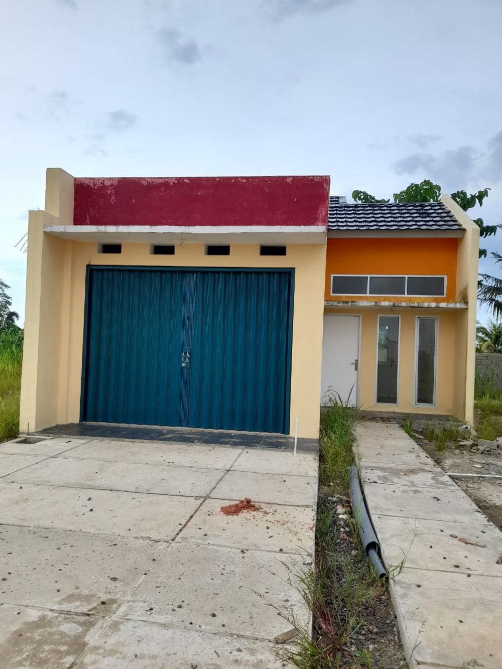 foto tampak rumah tipe Rumah Kios 48B perumahan OPI REGENCY 5