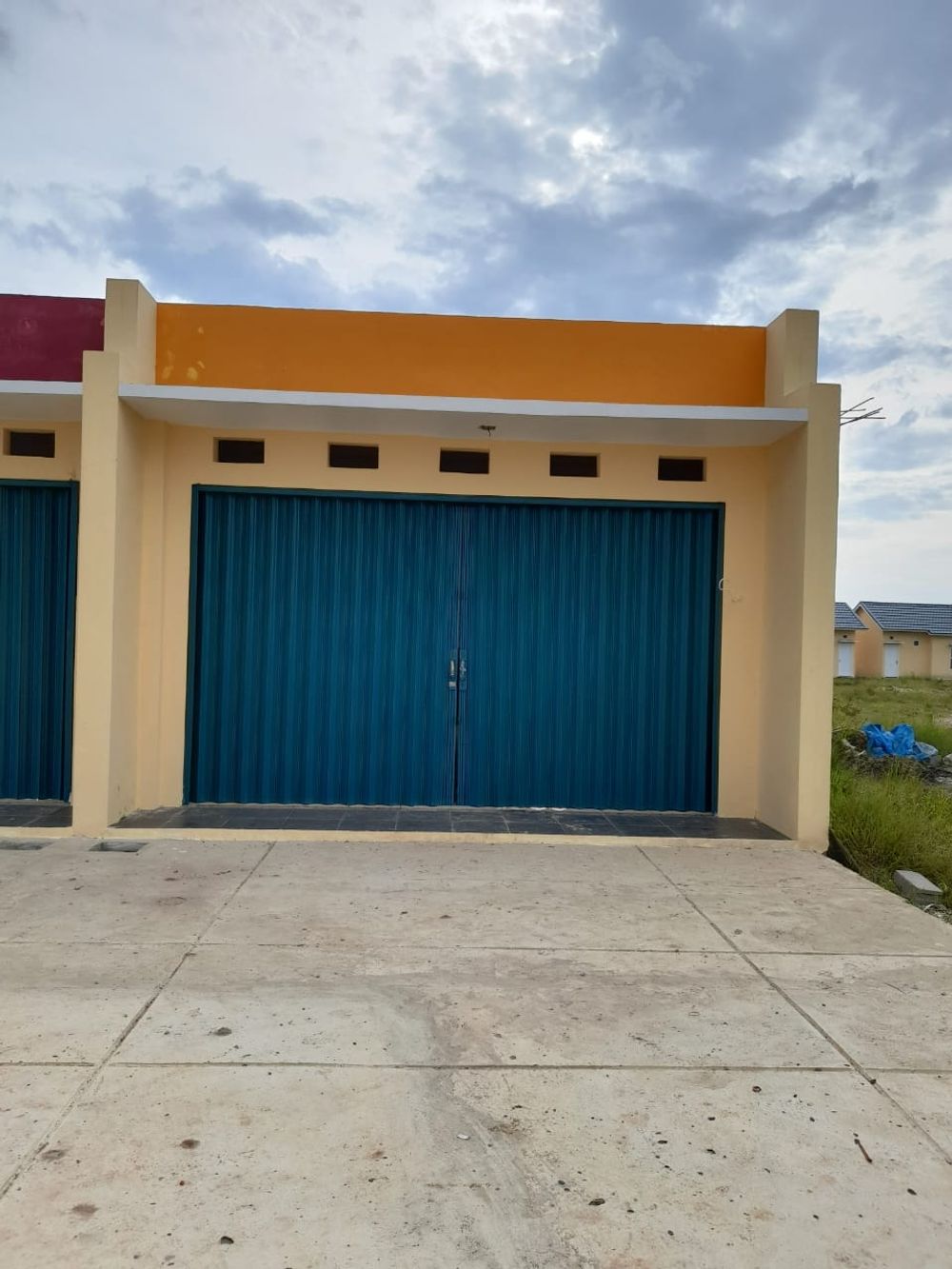 foto tampak rumah tipe Kios 48A perumahan OPI REGENCY 5