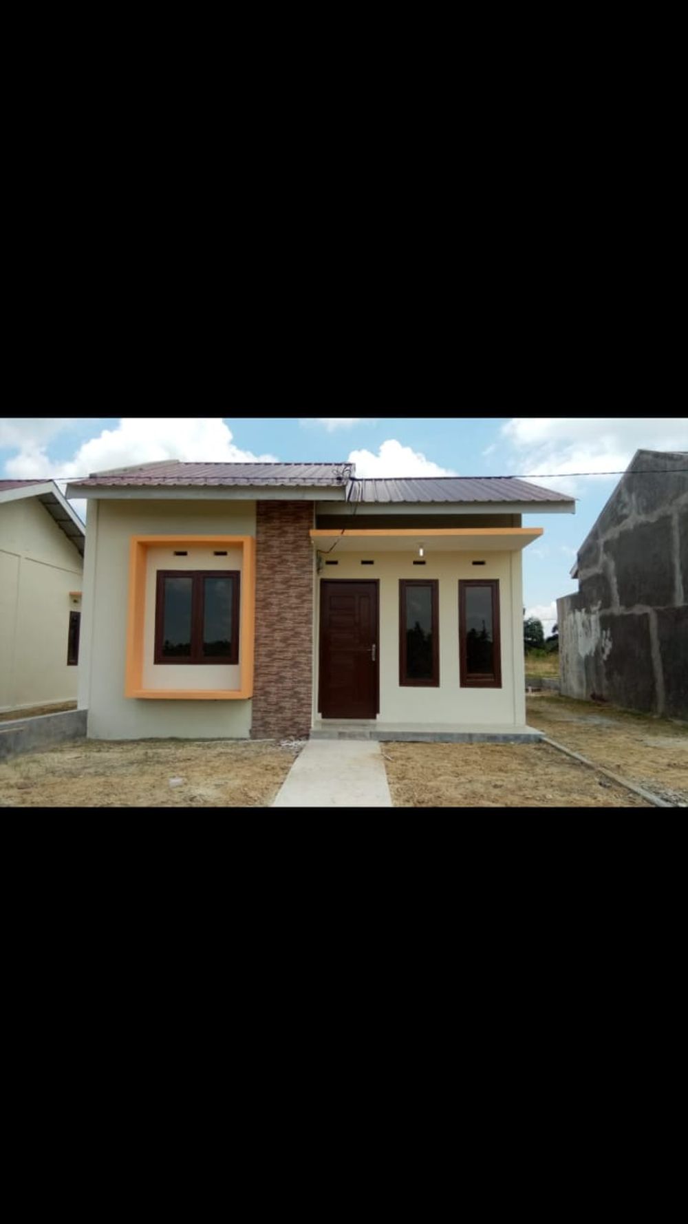foto tampak rumah tipe 36 perumahan FAJAR ANDALAS