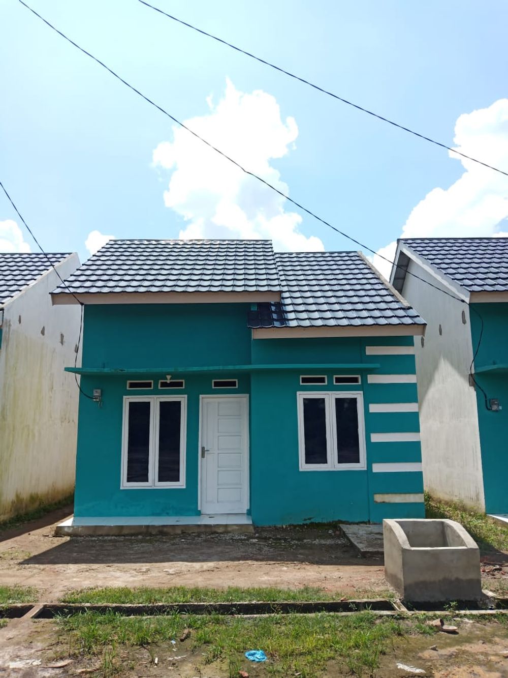 foto tampak rumah tipe 36/84 perumahan BCM PERSADA 2