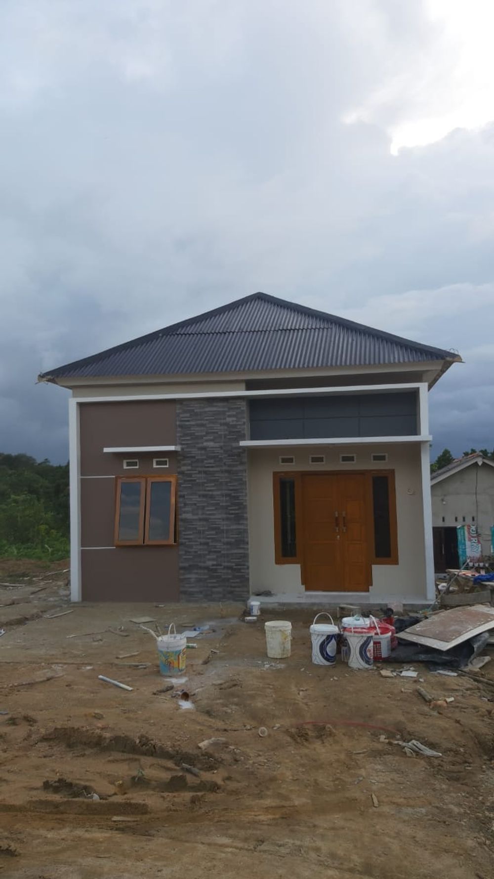 foto tampak rumah tipe 36/91 perumahan ARTISTIK RESIDENCE