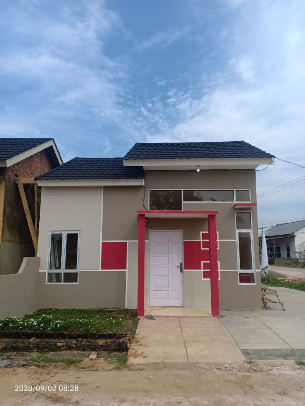 foto tampak rumah tipe 36 perumahan Berlian Melaburi Residence