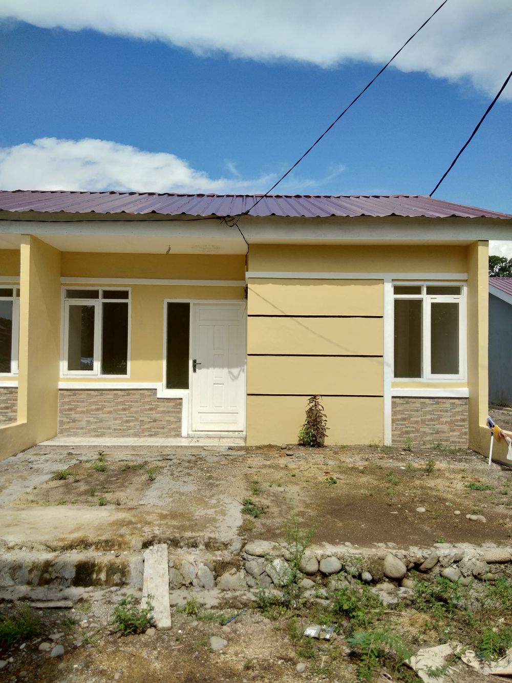 foto tampak rumah tipe 36/72 perumahan PERUMAHAN BUMI BORONGLOE PERMAI