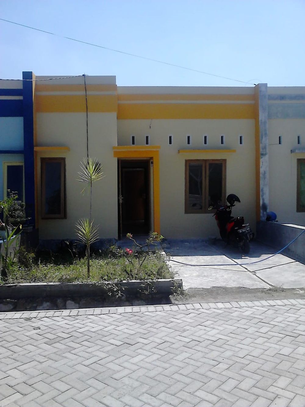 foto tampak rumah tipe 24 perumahan WELL GREEN RESIDENCE
