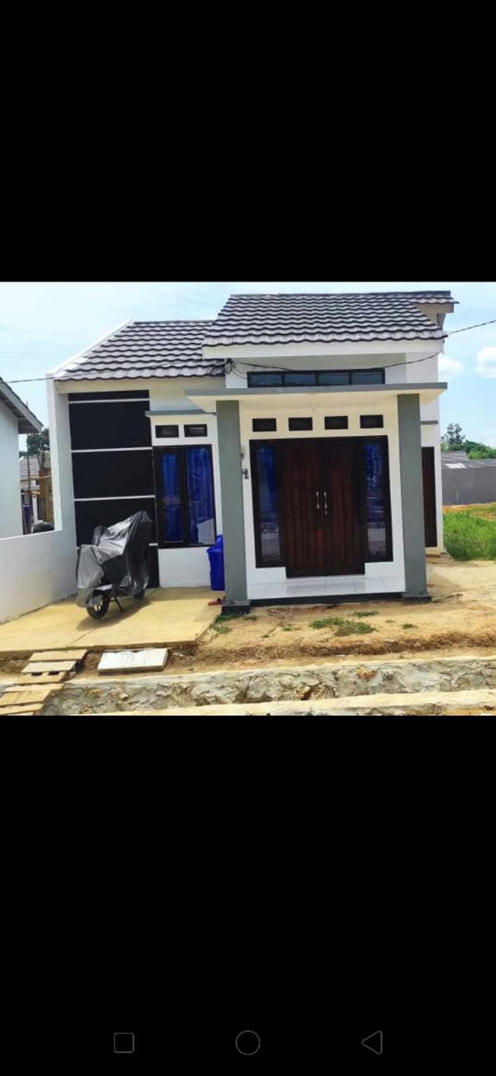 foto tampak rumah tipe 36 perumahan GRAND RASAK VILLAGE