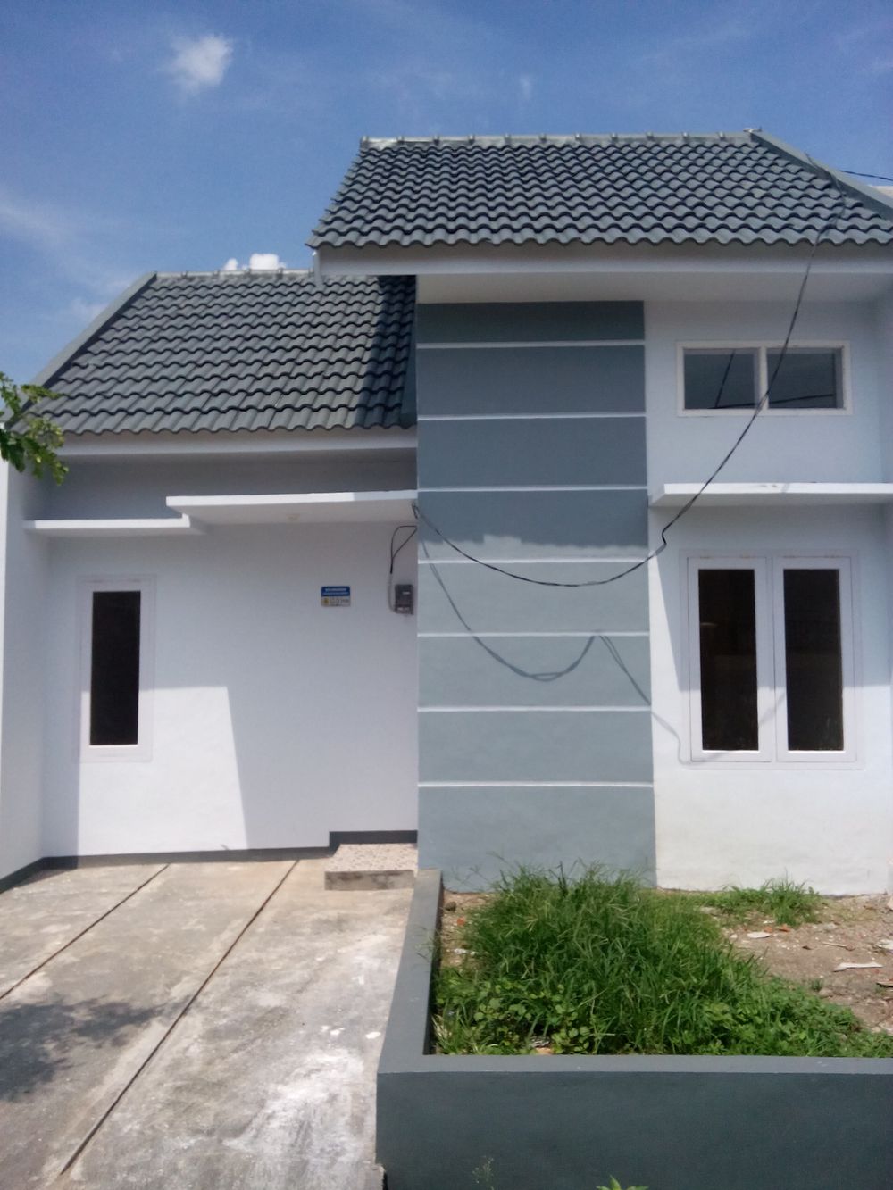 foto tampak rumah tipe 36 perumahan Sriwijaya Land