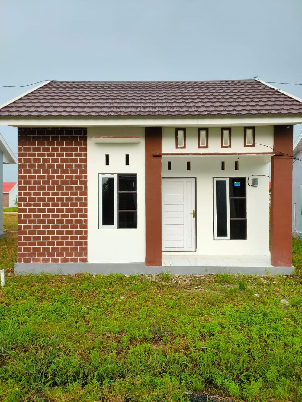 foto tampak rumah tipe 36 Blok 14 Timur perumahan Bina Karya Permai