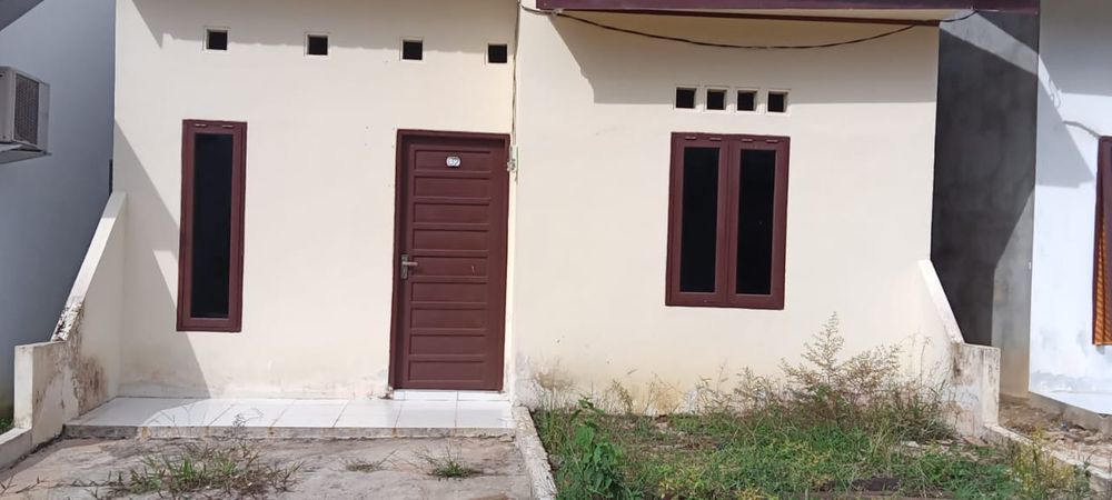 foto tampak rumah tipe 36/84 perumahan PERUMAHAN PURI KARANG JOANG