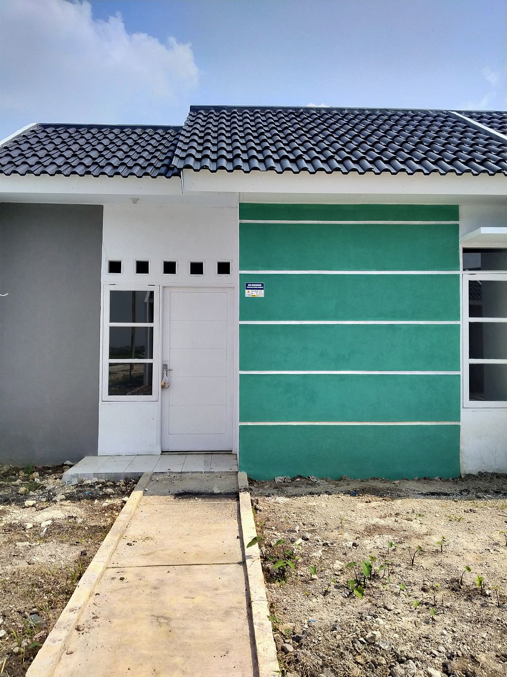 foto tampak rumah tipe 25/60 perumahan GRAHA CIPTA 5 BLOK H