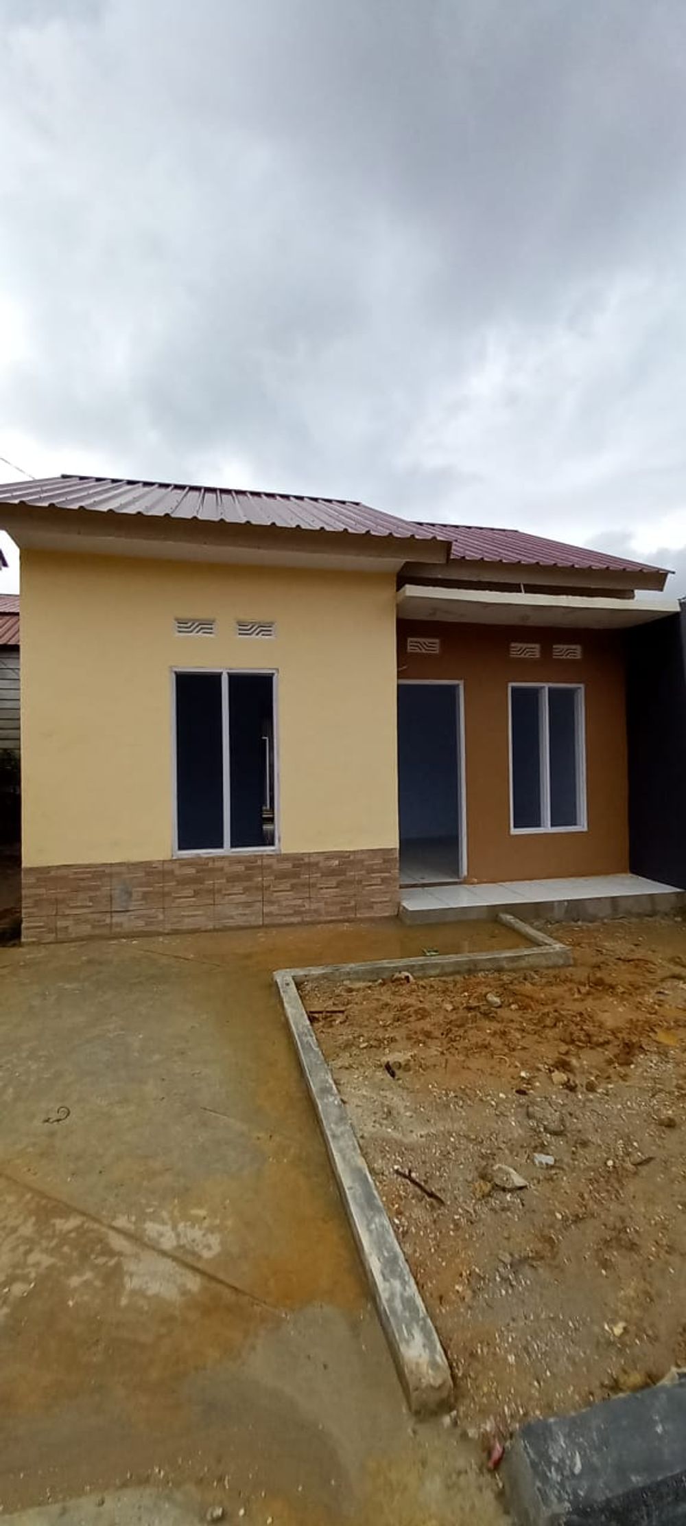 foto tampak rumah tipe 36 perumahan RESKITA ANAWAI