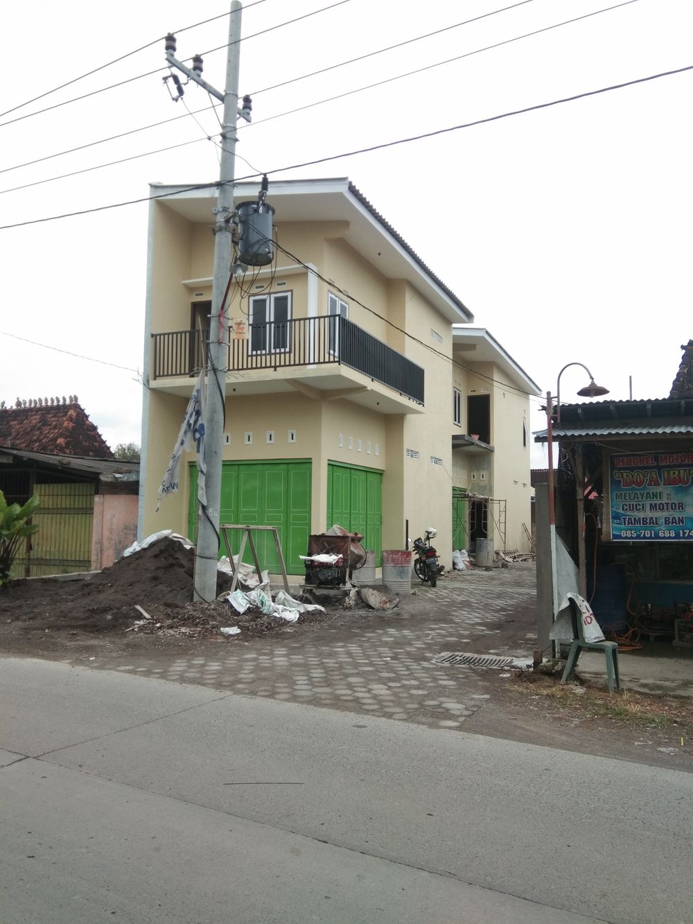 foto tampak rumah tipe 54 perumahan Graha Mulia Karangawen 2