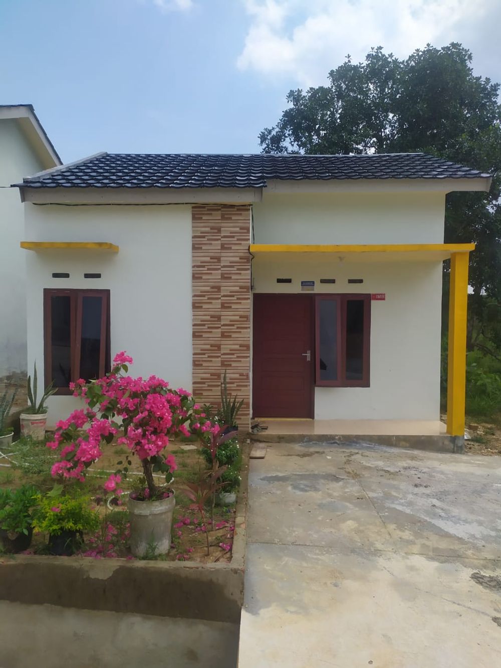 foto tampak rumah tipe RSS perumahan Aksarah Muaro Residence