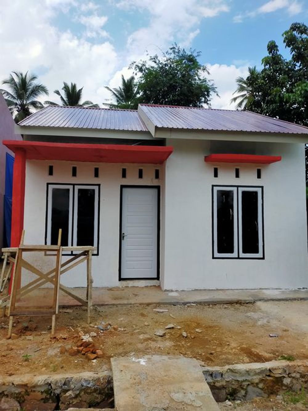 foto tampak rumah tipe RHS 36 perumahan BUMI NGALAU INDAH