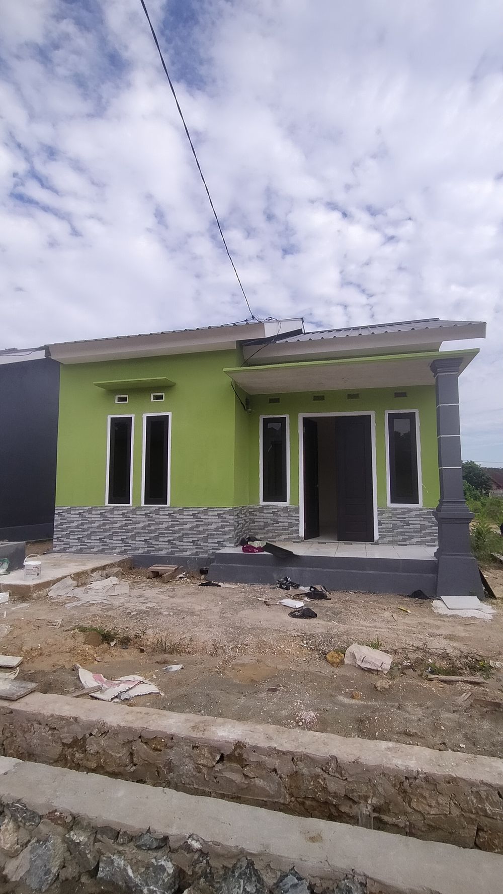 foto tampak rumah tipe 36 perumahan BUMI ARUM III