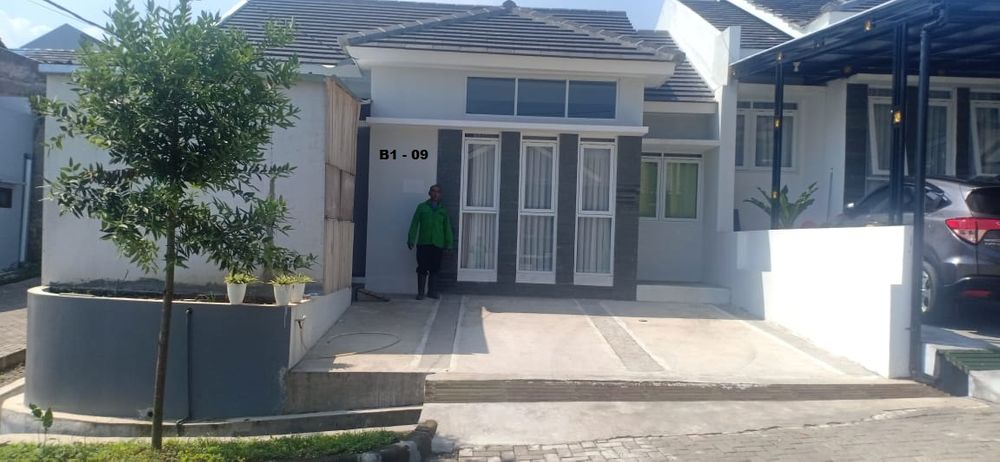 foto tampak rumah tipe 57/105 perumahan Buana Flamingo Hill Regency