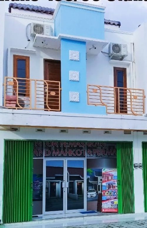 foto tampak rumah tipe 100/60 perumahan GRAND MAHKOTA PERMAI