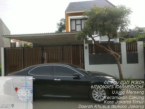 foto tampak rumah tipe Grand Mezzano perumahan Metland Menteng