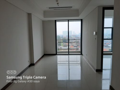 foto tampak rumah tipe Bella 2BR B perumahan Casa Grande Residence