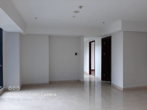 foto tampak rumah tipe Bella 3BR B perumahan Casa Grande Residence