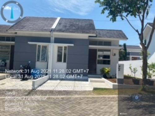foto tampak rumah tipe Fresia perumahan BSB Village Aurora Terrace