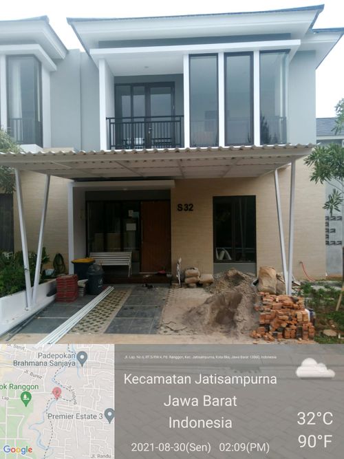 foto tampak rumah tipe Besancon perumahan Premier Estate 3