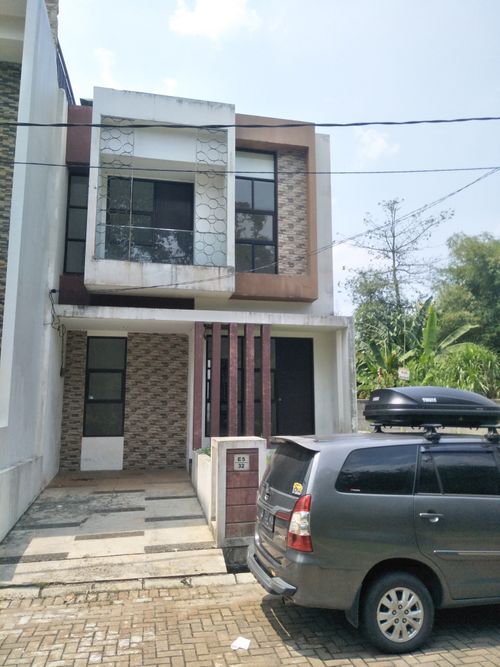 foto tampak rumah tipe 69 GRANIA perumahan CENDANA RESIDENCE