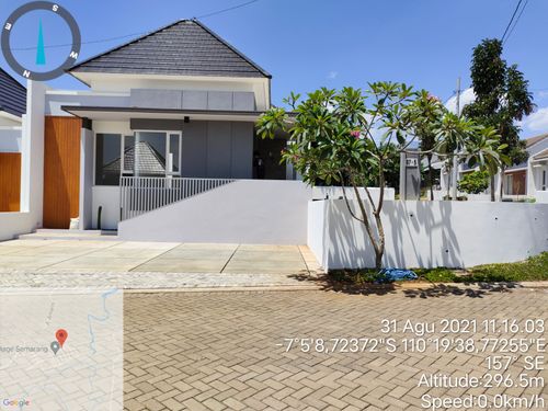 foto tampak rumah tipe 68 perumahan BSB village Aurora Spring Boulevard