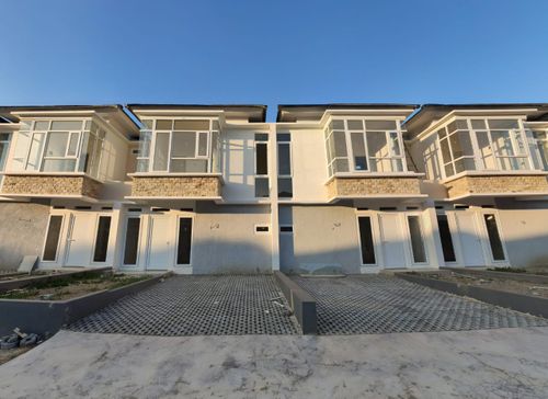 foto tampak rumah tipe JAVANICCA TENGAH DMJ 8 perumahan PERUMNAS GRAND CILEGON RESIDENCE