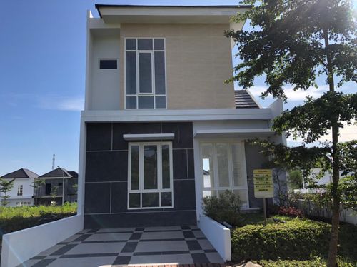 foto tampak rumah tipe 69 perumahan Tamansari Metropolitan Manado