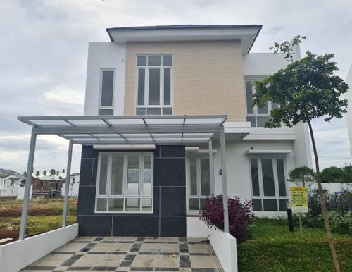 foto tampak rumah tipe 115 perumahan Tamansari Metropolitan Manado