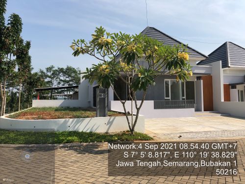 foto tampak rumah tipe 68 perumahan BSB village Aurora Spring Boulevard