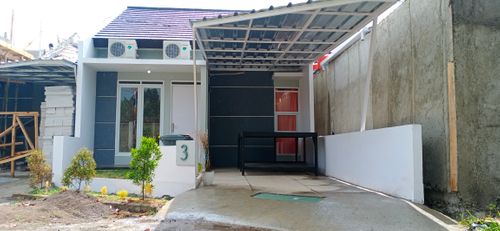 foto tampak rumah tipe CA-IV 30/77 perumahan Bumi Panyawangan Cluster Rasamala dan Campaka
