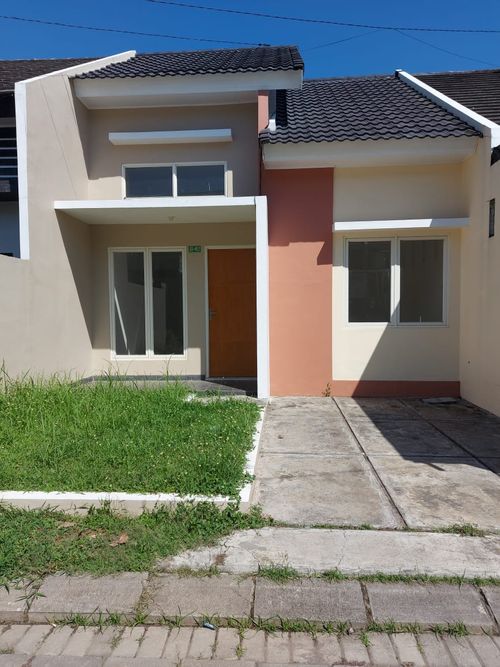 foto tampak rumah tipe EMERALDA perumahan MUTIARA INDAH VILLAGE