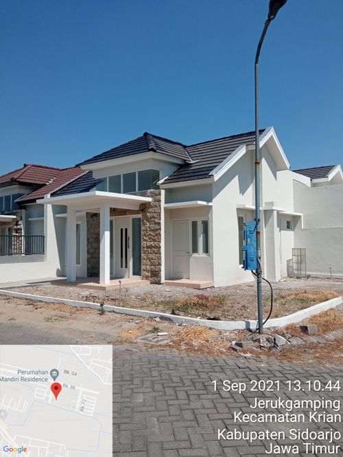 foto tampak rumah tipe Tulip perumahan Mandiri Residence