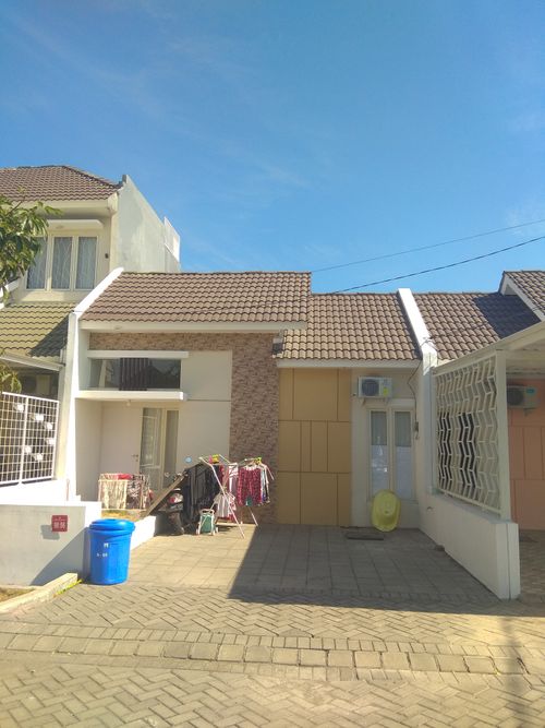 foto tampak rumah tipe PEONY - III-56 perumahan GRAND DELTA SARI