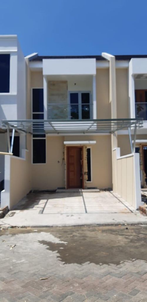 foto tampak rumah tipe RCV perumahan Roma corner view PT. AsindoIndah Griyatama