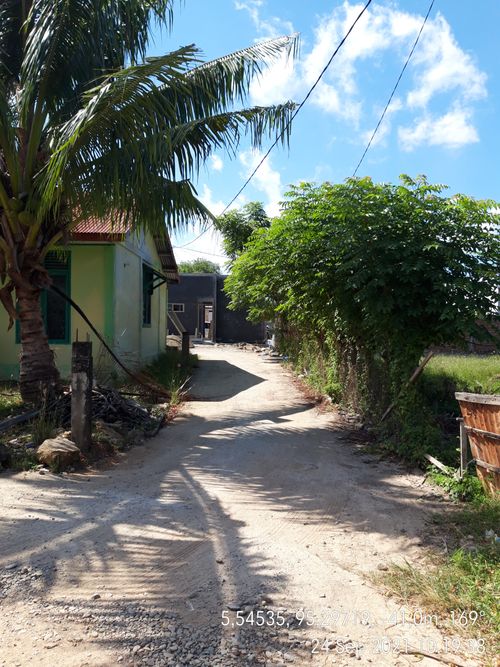 foto gerbang perumahan Medina residence