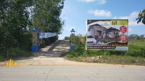 foto gerbang perumahan AMORA LAND
