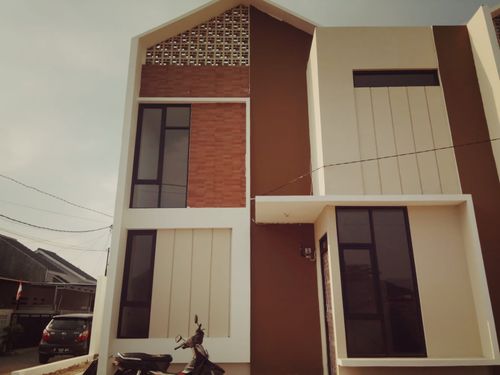 foto tampak rumah tipe 42 Mezzanine (408) perumahan Griya Pataruman Asri 3