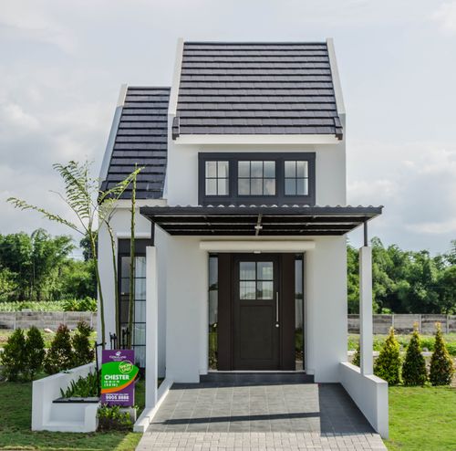 foto tampak rumah tipe Chester Grand perumahan CitraLand Driyorejo CBD