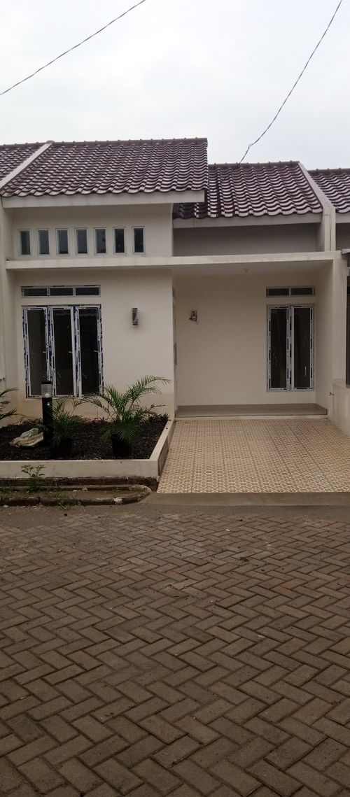 foto tampak rumah tipe 47/96 perumahan Grand Sokka Residence