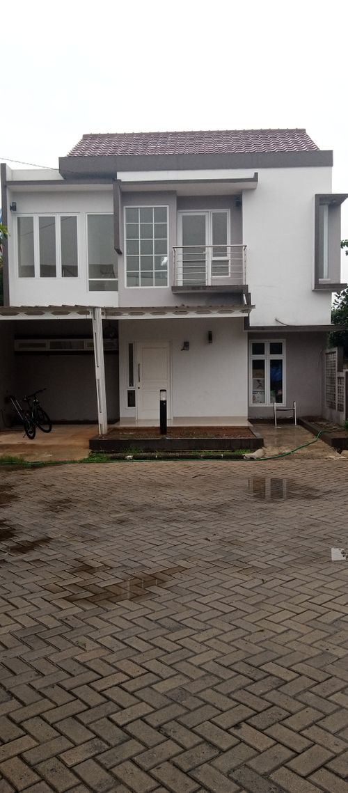 foto tampak rumah tipe 119/128 perumahan Grand Sokka Residence