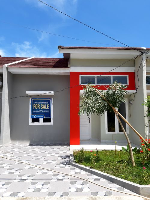 foto tampak rumah tipe PAMPANG 126 perumahan GRIYA HARAPAN PAMPANG