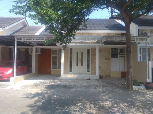 foto tampak rumah tipe 70 perumahan FIRDAUS MANSION