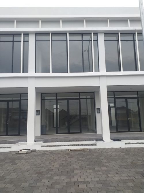 foto tampak rumah tipe RUKO NORTH C perumahan CitraLand Driyorejo CBD