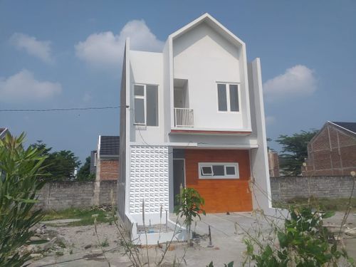 foto tampak rumah tipe 70 2 LANTAI perumahan FIRDAUS MANSION